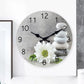horloge à motif pierre zen et fleur