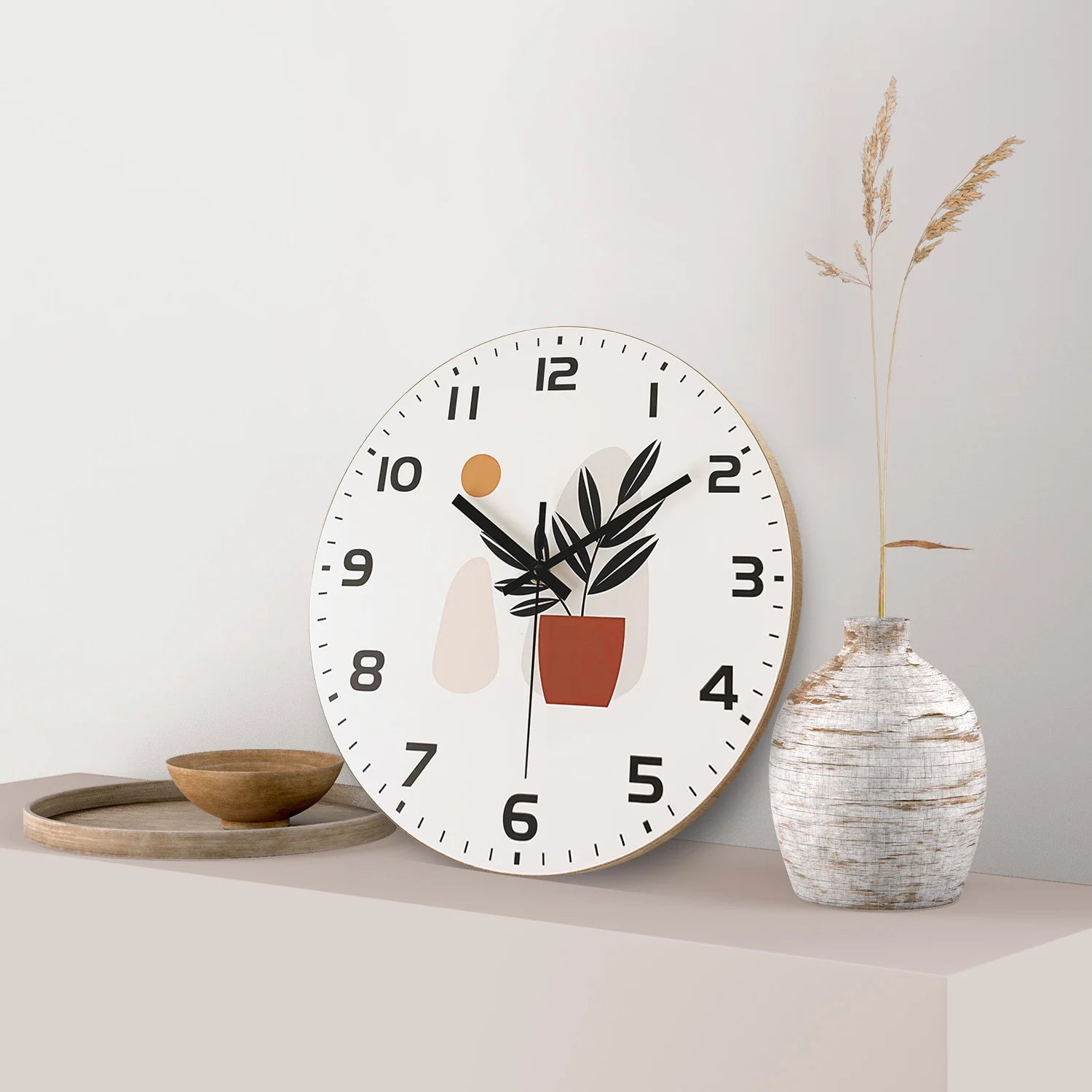 Horloge murale blanche à motif de pot de fleurs