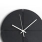 Horloge murale noire en bois
