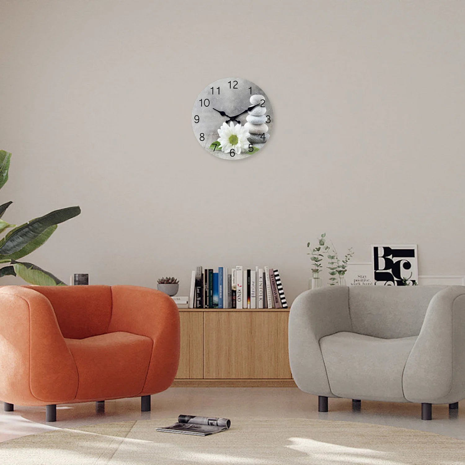 horloge à motif pierre zen et fleur